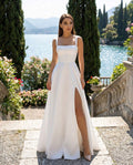 Abito da sposa bianco lungo, con spacco elegante e raffinato in raso